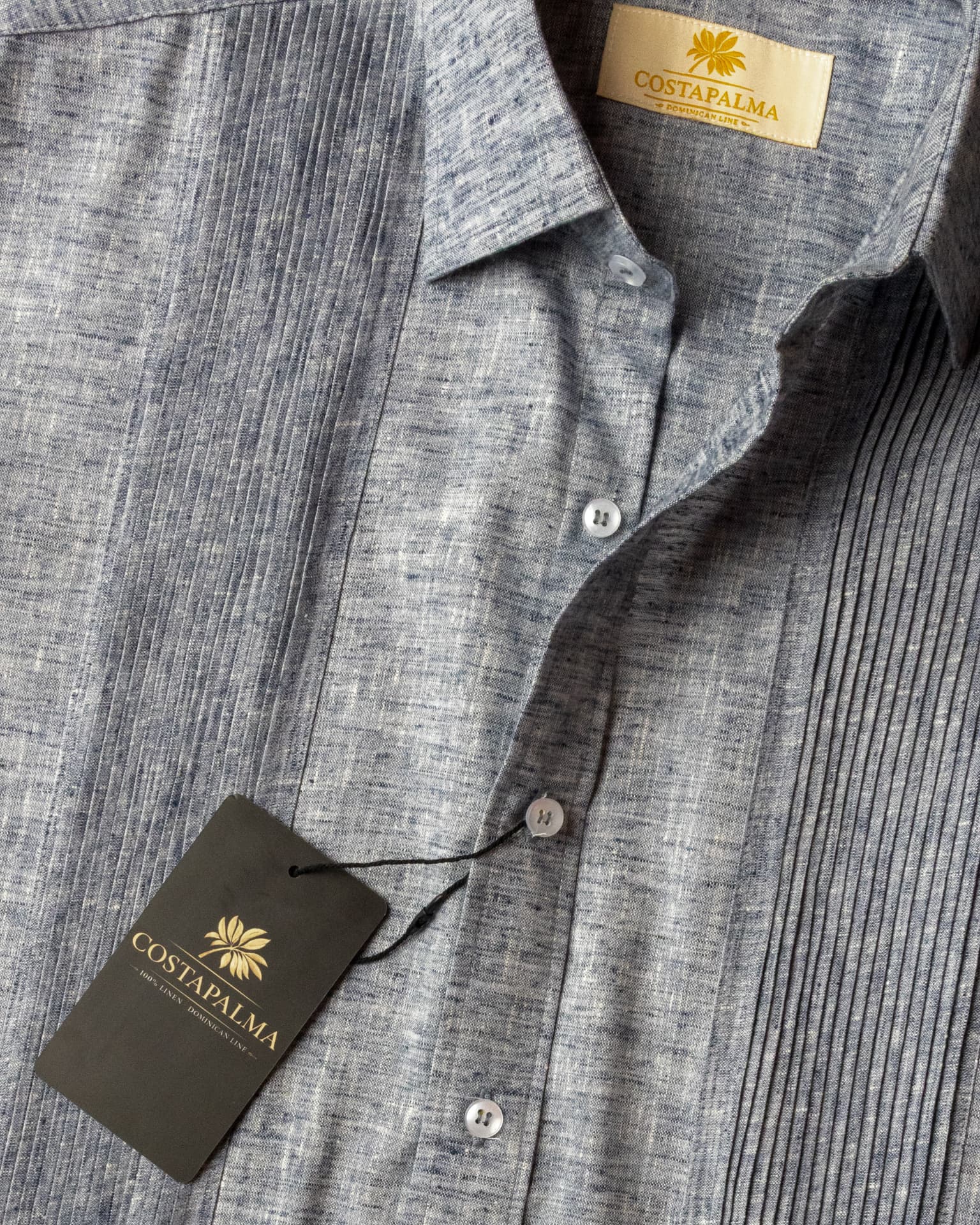 Linen guayabera photographed to show body width and hem length